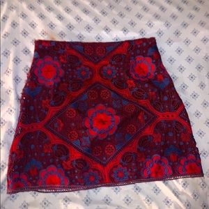 red and blue flowered skirt